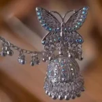 butterfly oxidised jhumka earrings with chain ghungroo design