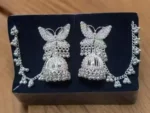 butterfly oxidised jhumka earrings with chain ghungroo design